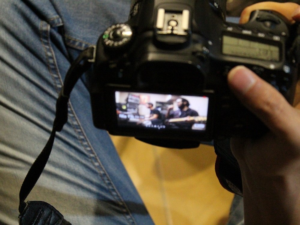Behind the camera on a video shoot